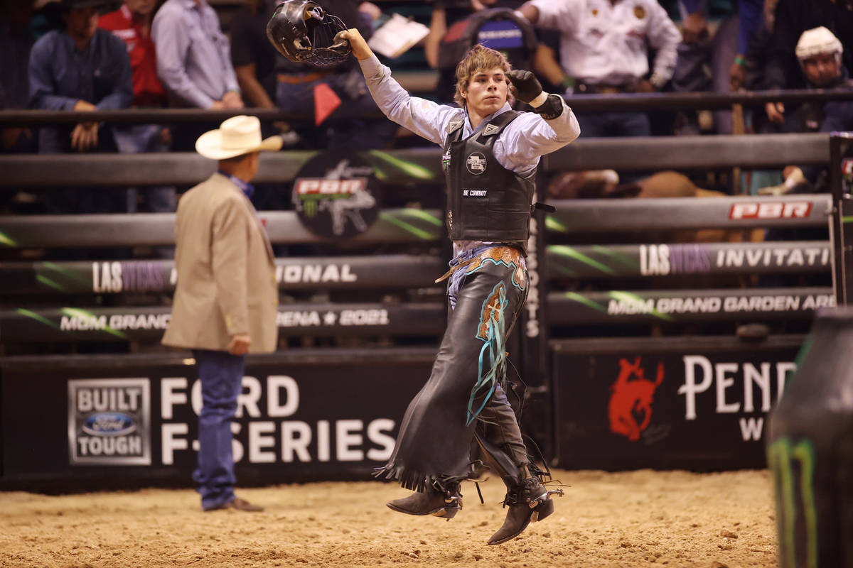 Bull rider Conner Halverson reacts after his run during the Professional Bull Riders Las Vegas ...