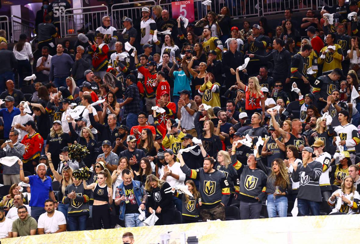 Golden Knights fans cheer at the end of the second period of Game 4 of an NHL hockey Stanley Cu ...
