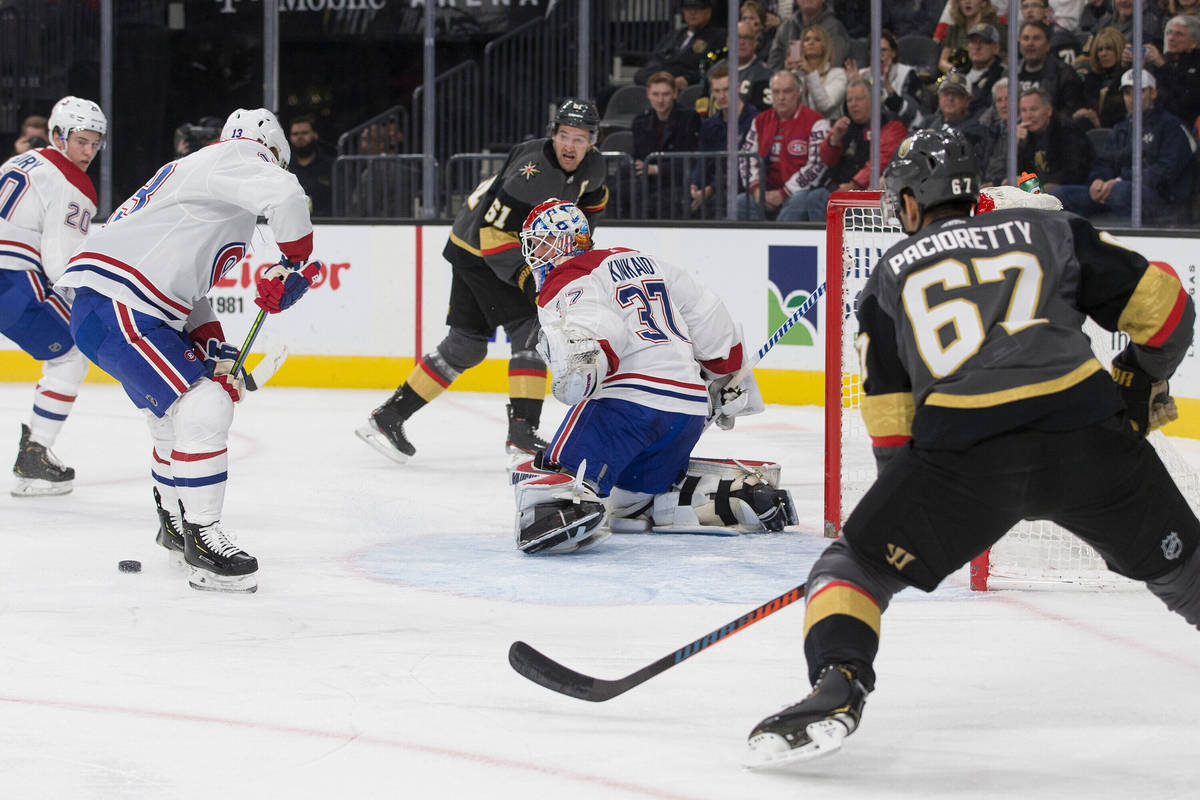 Vegas Golden Knights left wing Max Pacioretty (67) shoots on Montreal Canadiens goaltender Keit ...