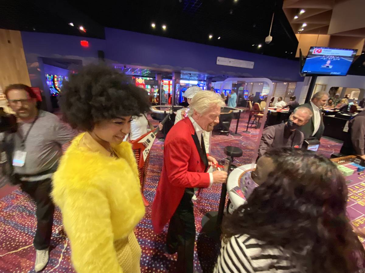 Virgin Group founder Richard Branson is shown at a Virgin Hotels Las Vegas craps table, Friday, ...