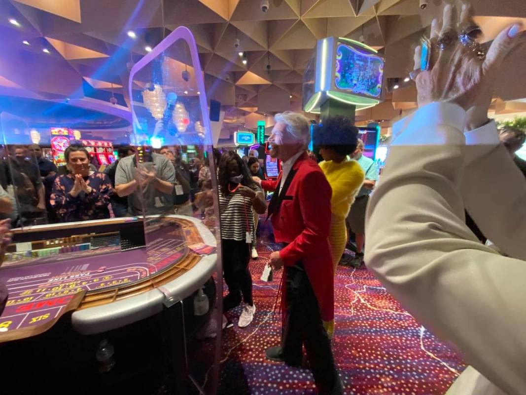 Virgin Group founder Richard Branson is shown at a Virgin Hotels Las Vegas craps table, Friday, ...