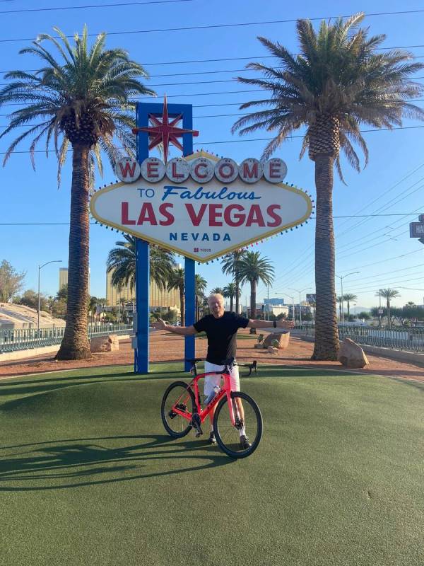 Virgin Group founder Richard Branson is shown at the Welcome to Fabulous Las Vegas sign during ...
