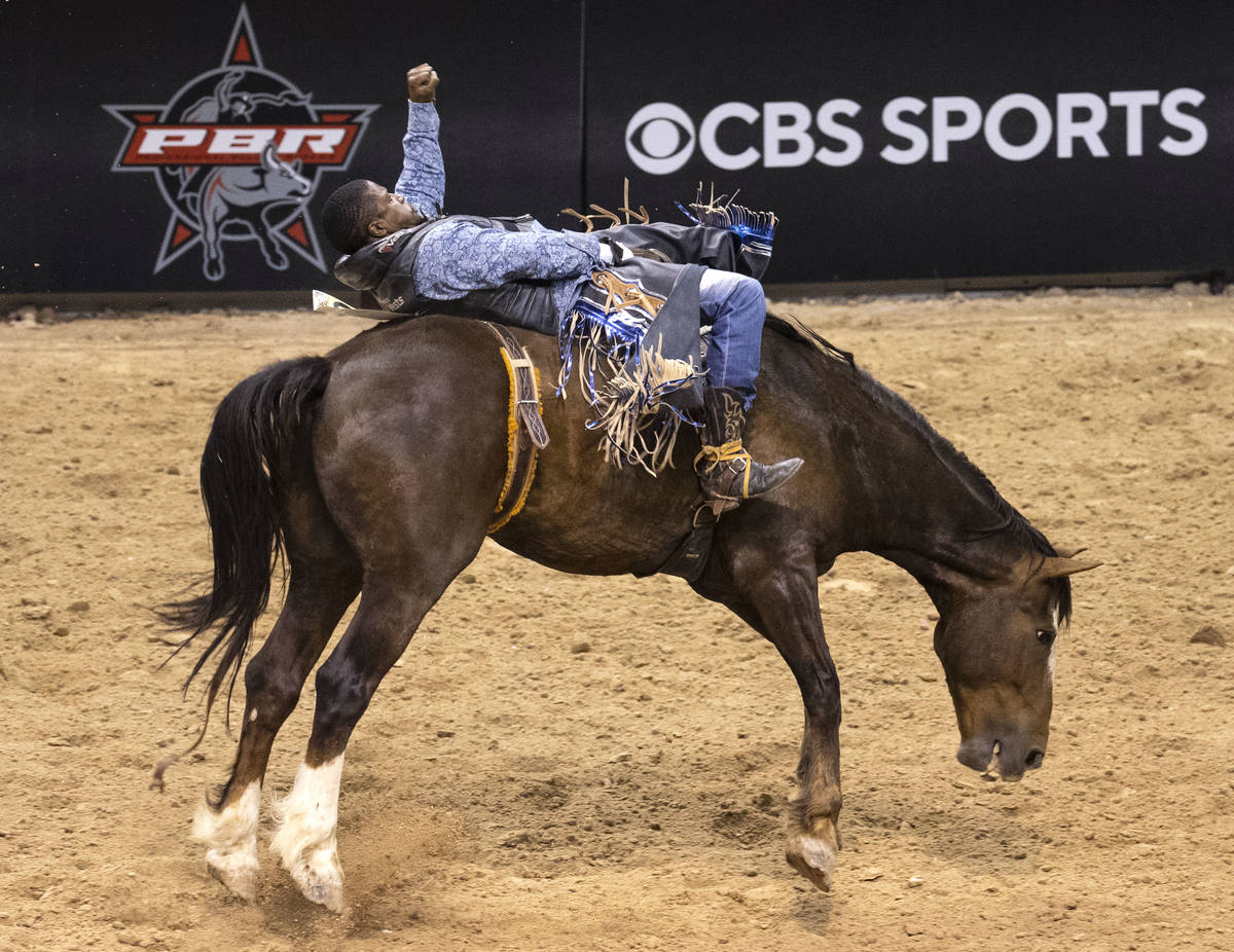 Patrick Liddle, of Watts, Calif., participates in bareback riding competition at the Bill Picke ...