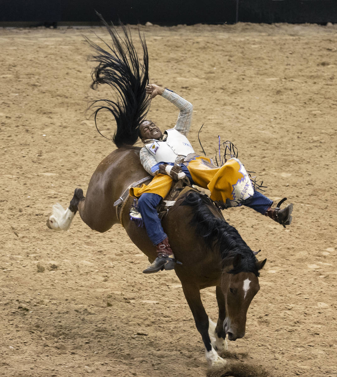 Harold Miller, of Liberty S.C., participates in bareback riding competition at the Bill Pickett ...