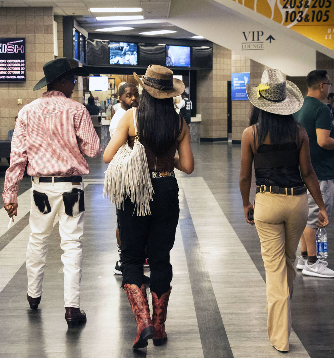 People arrive to watch the Bill Pickett Invitational Rodeo, the nation's only touring black rod ...