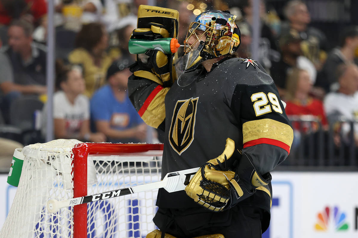 Vegas Golden Knights goaltender Marc-Andre Fleury (29) drinks water during a break in the secon ...