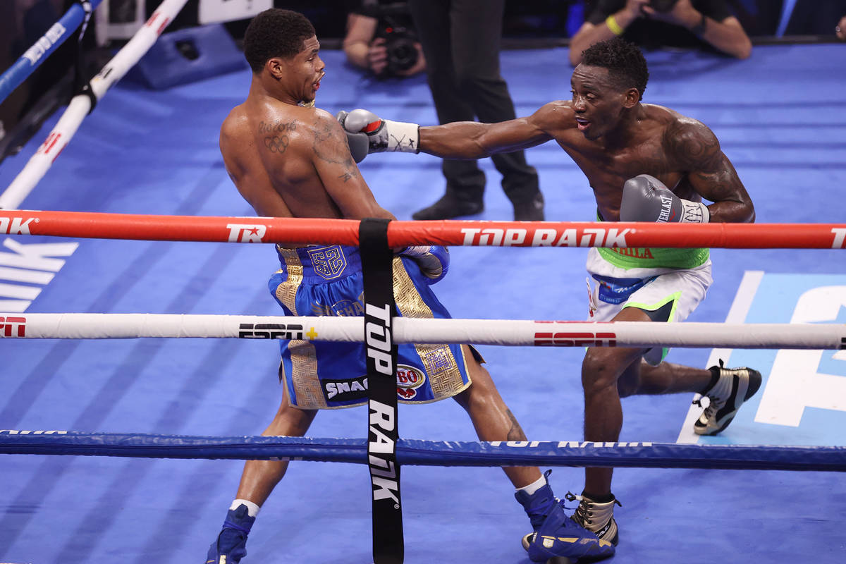 Shakur Stevenson, left, battles Jeremiah Nakathila in the 11th round of the WBO Interim Jr. Lig ...