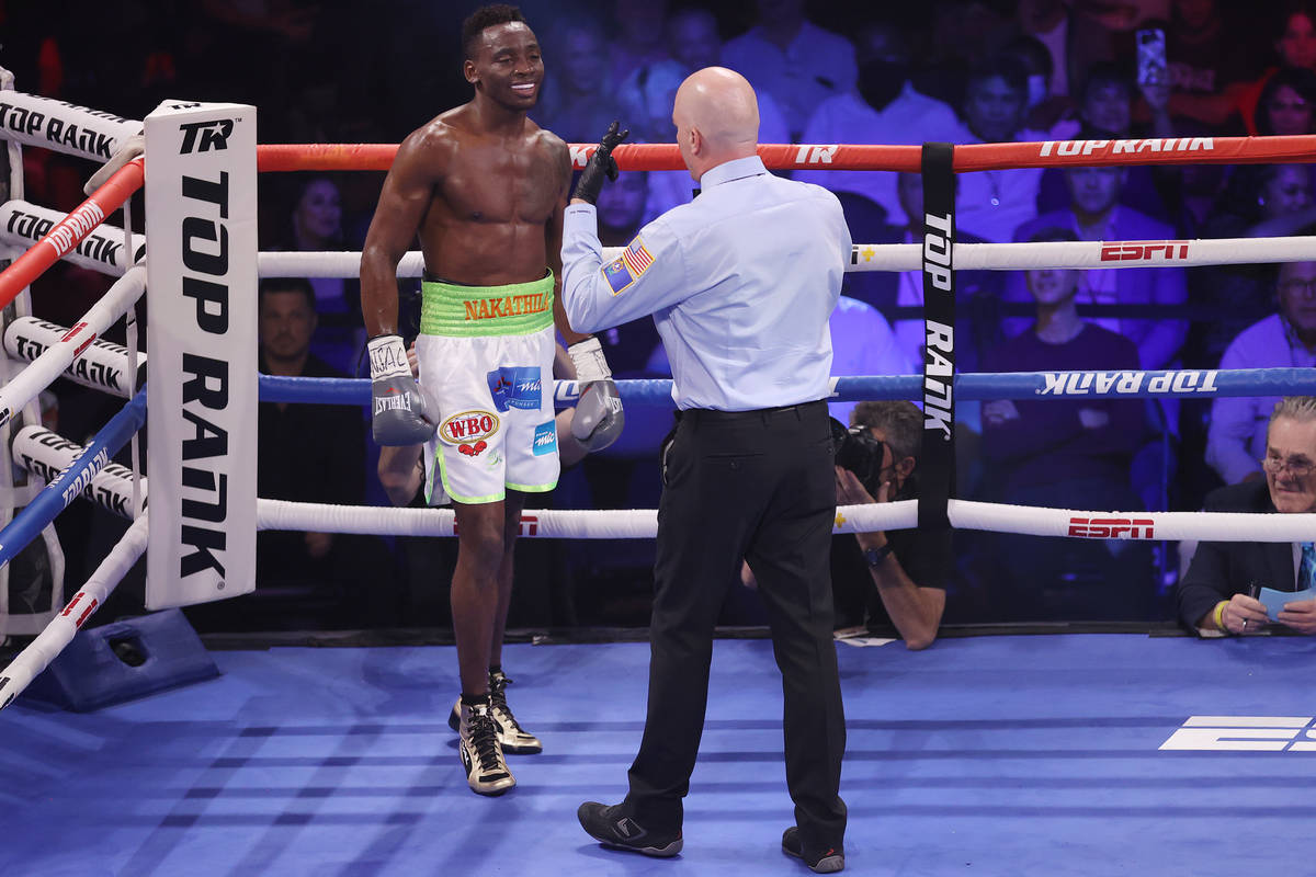 Jeremiah Nakathila gets a count after getting knocked down by Shakur Stevenson in the fourth ro ...