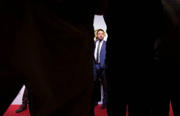 Actor Ben Affleck poses for photos during the Warner Bros. red carpet event at CinemaCon on Wed ...
