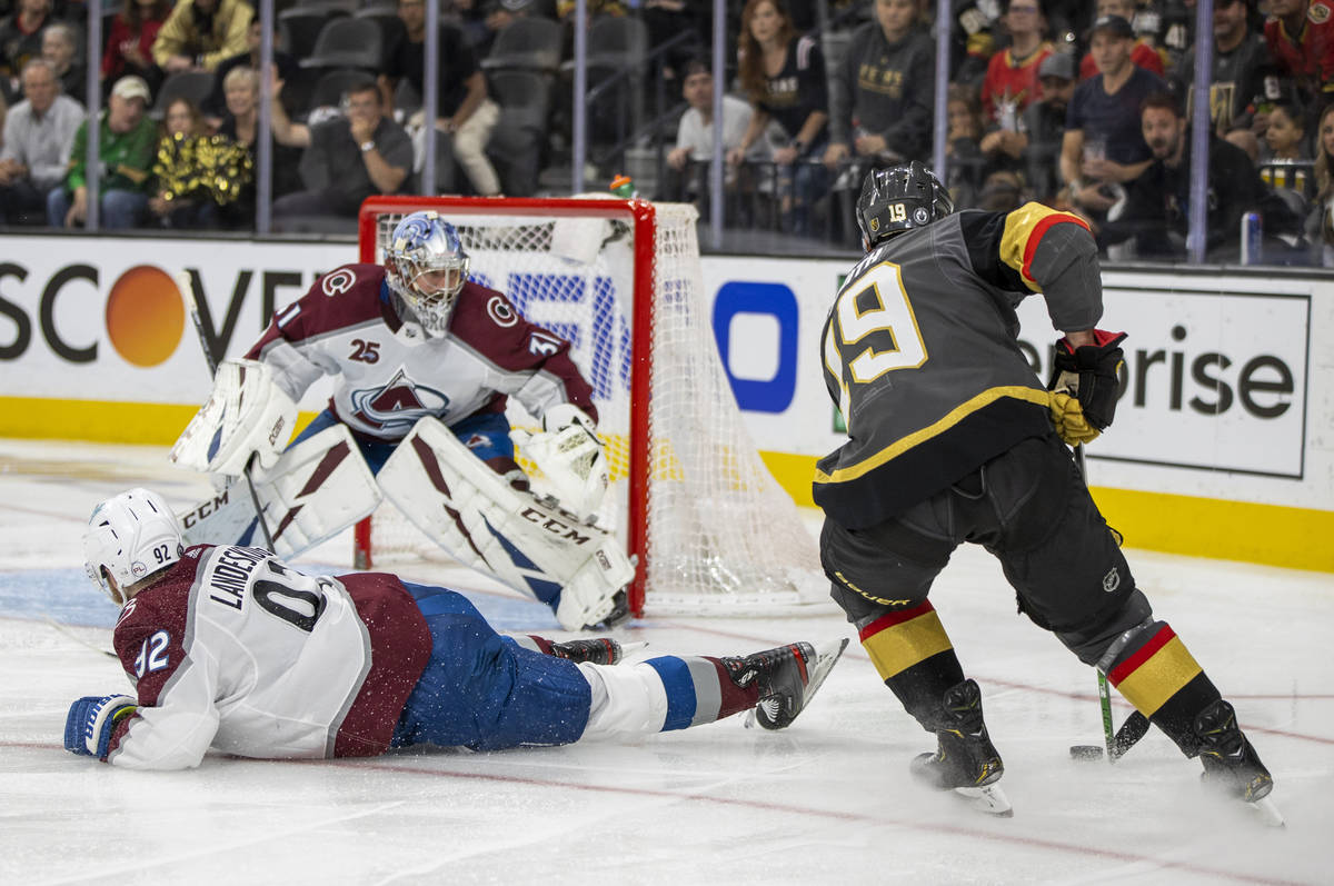 Golden Knights right wing Reilly Smith (19) looks to shoot past Colorado Avalanche left wing Ga ...