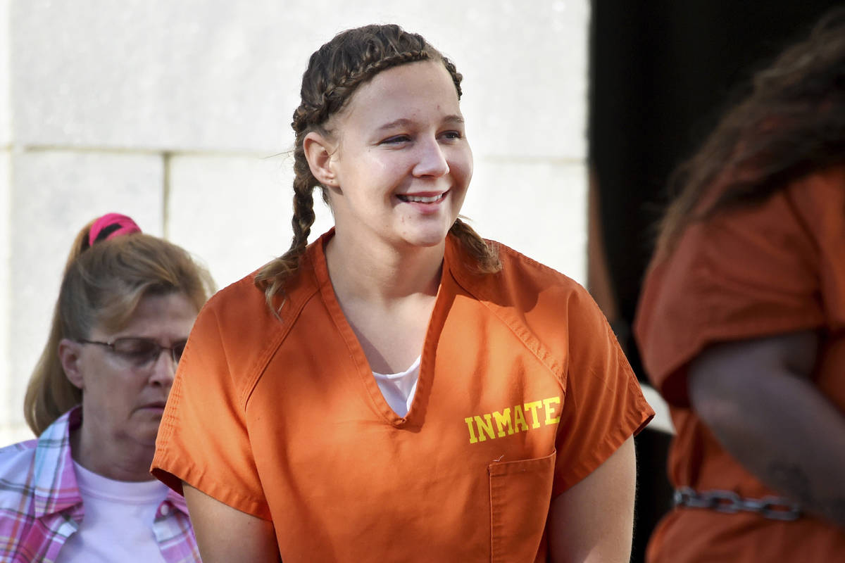 FILE- In this June 26, 2018 file photo, Reality Winner walks into the Federal Courthouse in Aug ...