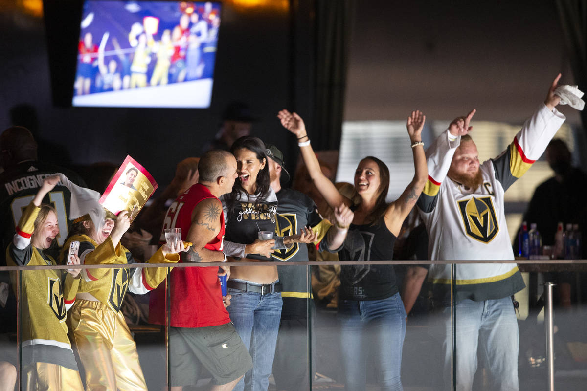 Golden Knights fans celebrate before the third period of Game 1 of an NHL Stanley Cup semifinal ...
