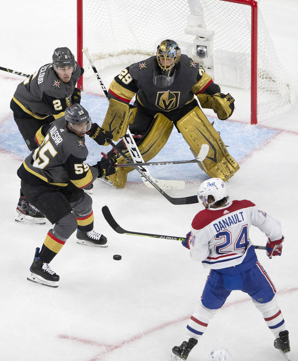 Golden Knights goaltender Marc-Andre Fleury (29) eyes an attempted shot by Canadiens left wing ...