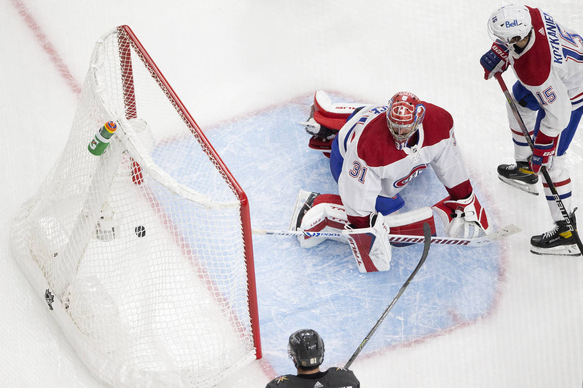 Canadiens goaltender Carey Price (31) watches Golden Knights defenseman Nick Holden's (22) goal ...