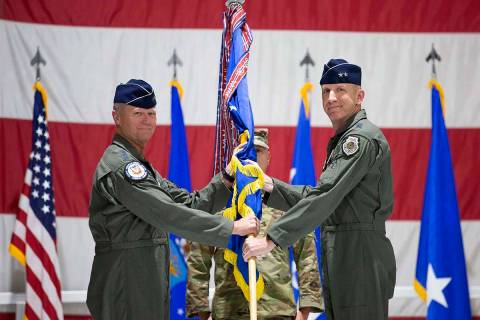 Gen. Mark Kelly, left, hands over command of the U.S. Air Force Warfare Center to Maj. Gen. Cas ...