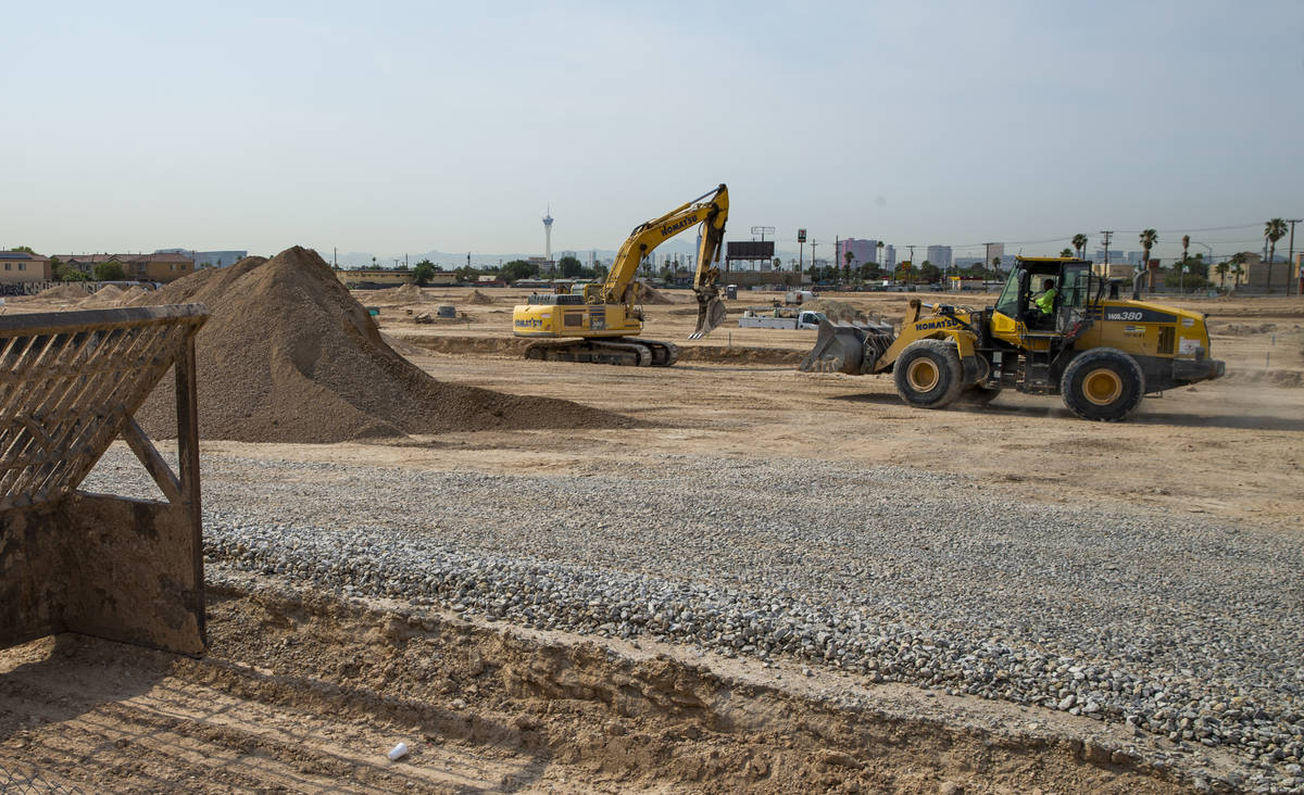 A construction crew begins work on Arcadia by Harmony Homes off of Rancho Drive on Wednesday, J ...