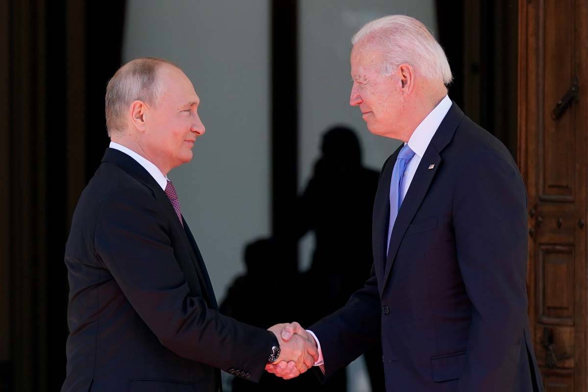President Joe Biden and Russian President Vladimir Putin, arrive to meet at the 'Villa la Grang ...