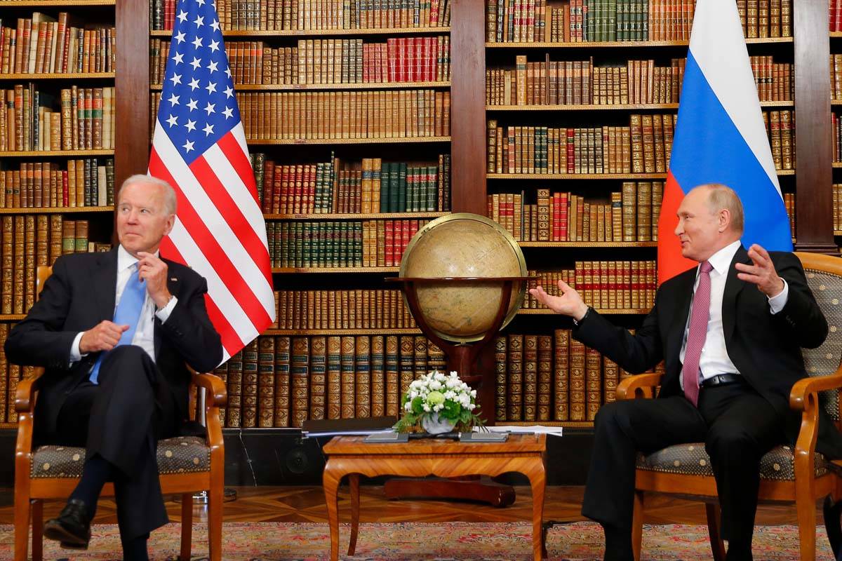U.S. President Joe Biden, left, and Russia's President Vladimir Putin, right, meet for the U.S. ...