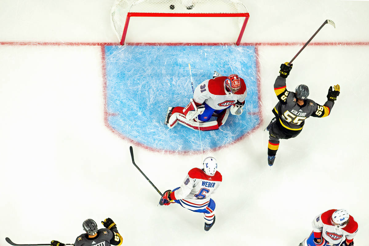 Golden Knights right wing Keegan Kolesar (55) celebrates a goal over Montreal Canadiens goalten ...
