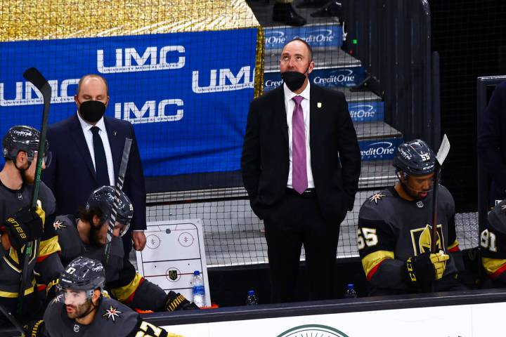 Golden Knights head coach Pete DeBoer looks on during the first period of Game 2 in an NHL hock ...