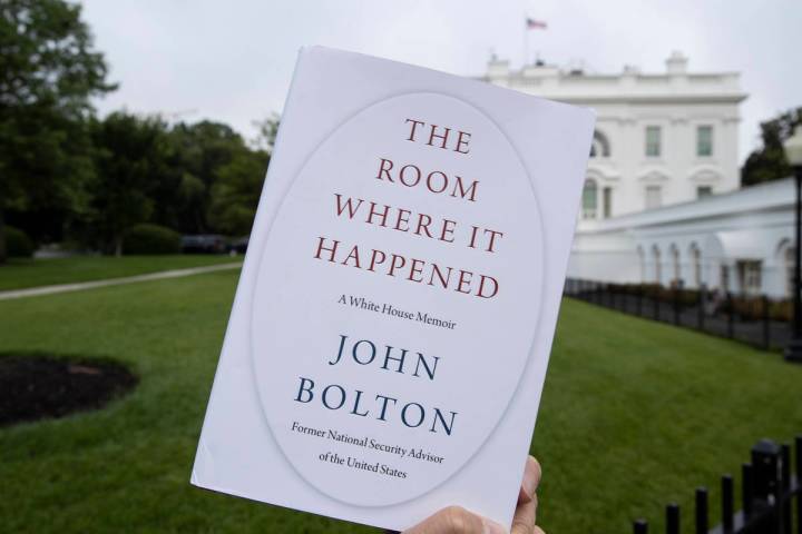 FILE - In this June 18, 2020, file photo a copy of "The Room Where It Happened," by f ...