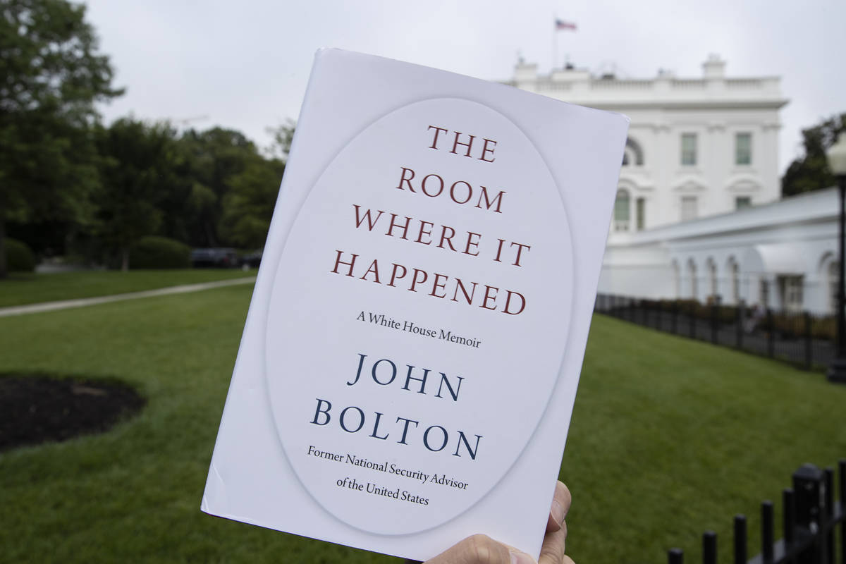 FILE - In this June 18, 2020, file photo a copy of "The Room Where It Happened," by f ...