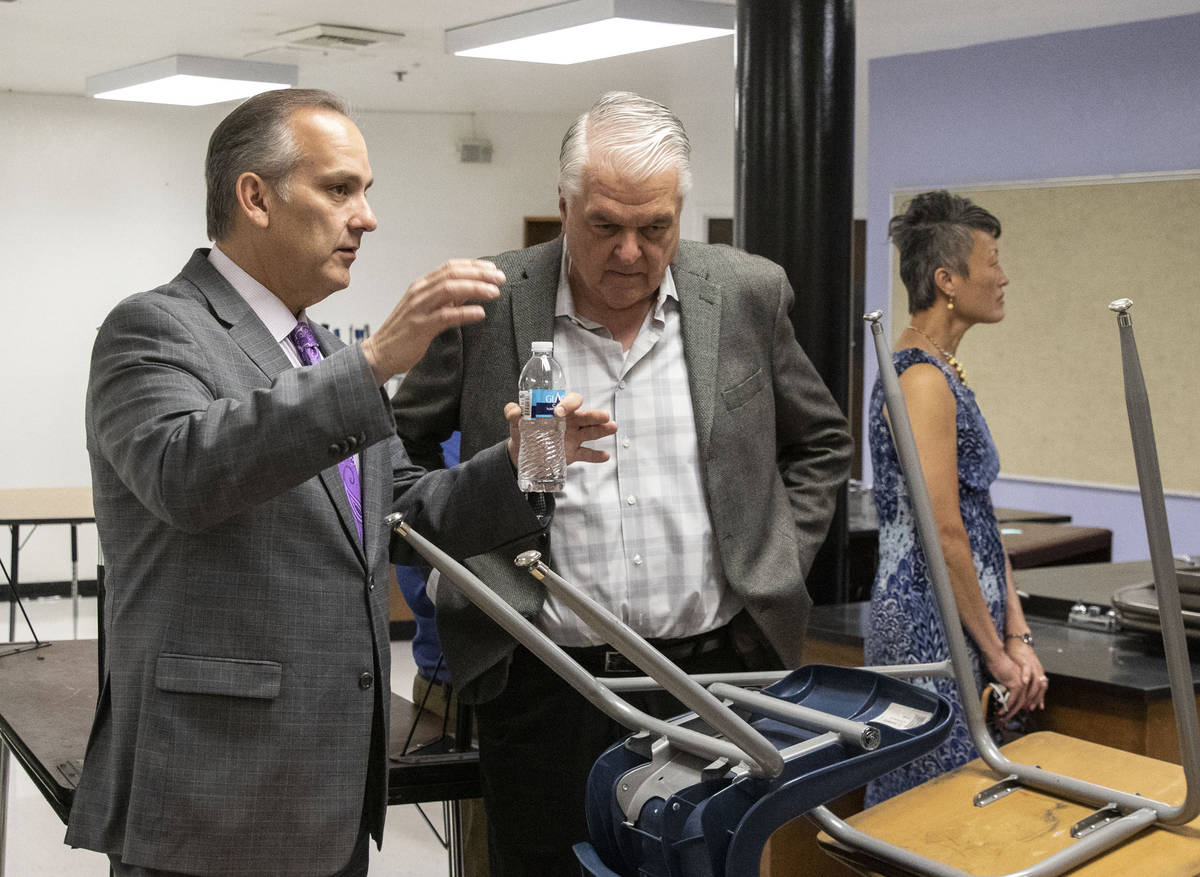 The Clark County School District Superintendent Jesus Jara, left, and Gov. Steve Sisolak discus ...