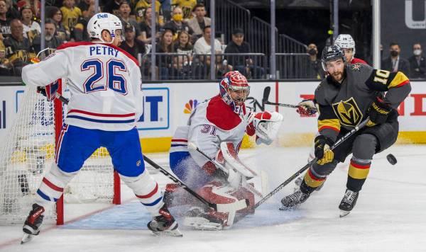 Golden Knights center Nicolas Roy (10) looks in the puck while closing in on Montreal Canadiens ...