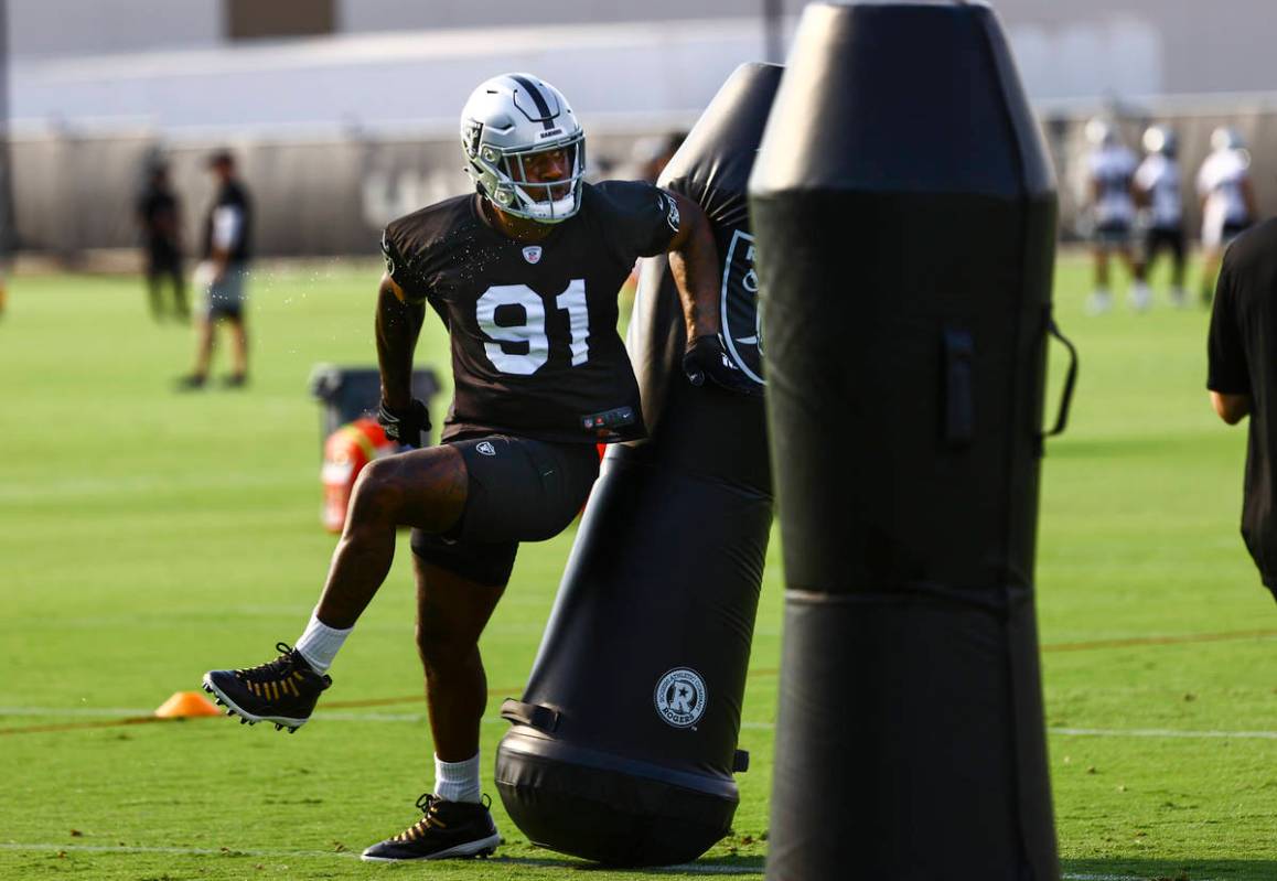 Raiders defensive end Yannick Ngakoue trains during an NFL football minicamp at Raiders headqua ...