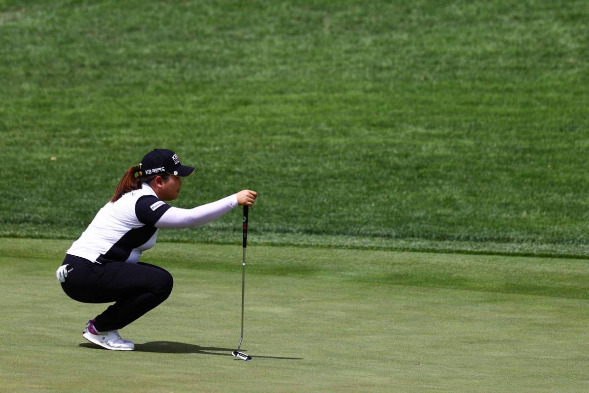 Inbee Park lines up a putt shot at the 12th hole during the first round of the Bank of Hope LPG ...