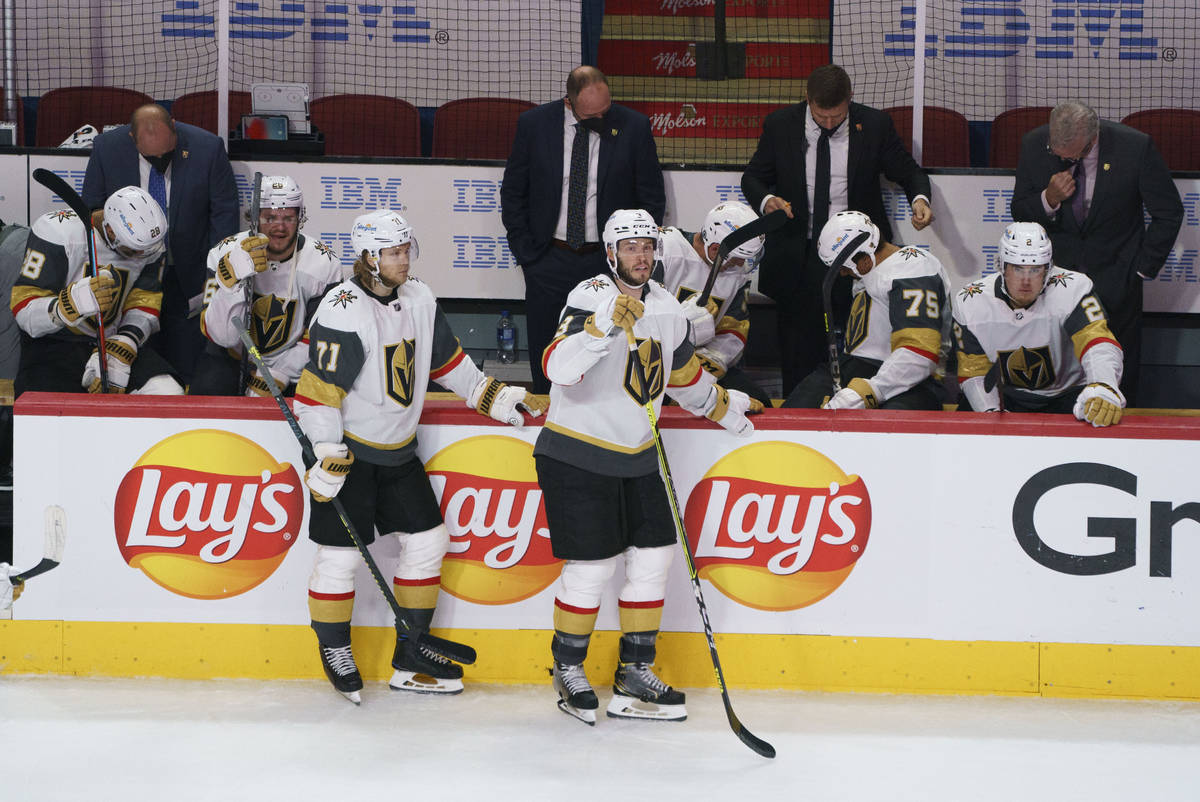 Vegas Golden Knights' William Karlsson, left, and Brayden McNabb watch the Montreal Canadiens c ...