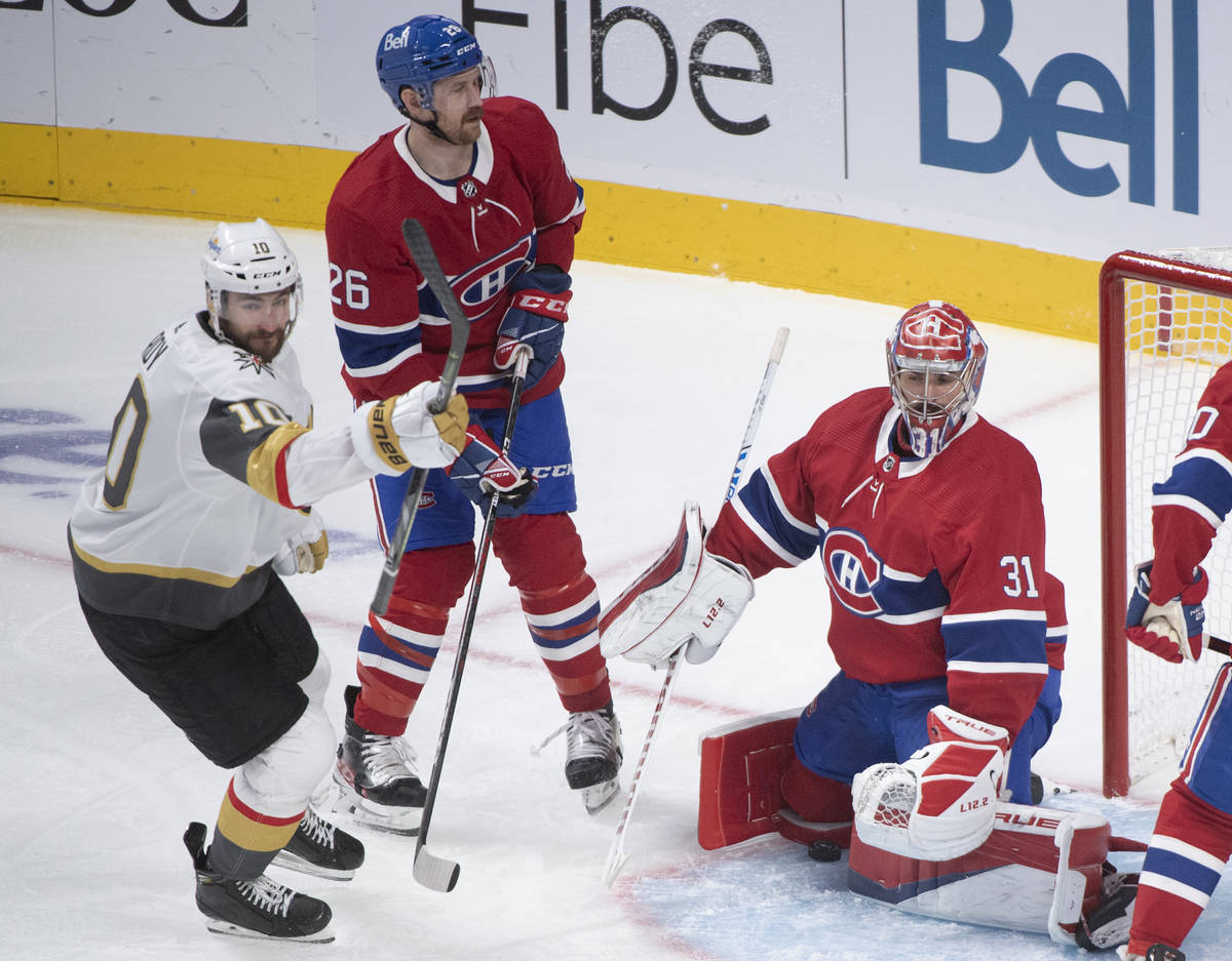 Vegas Golden Knights' Nicolas Roy (10) scores against Montreal Canadiens goaltender Carey Price ...