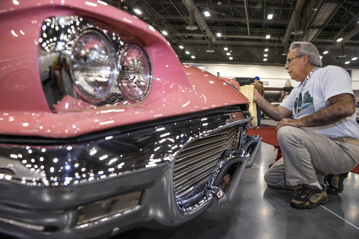 New owner Steve Maconi of Wilmington, Delaware, polishes up his 1959 Ford Thunderbird Convertib ...