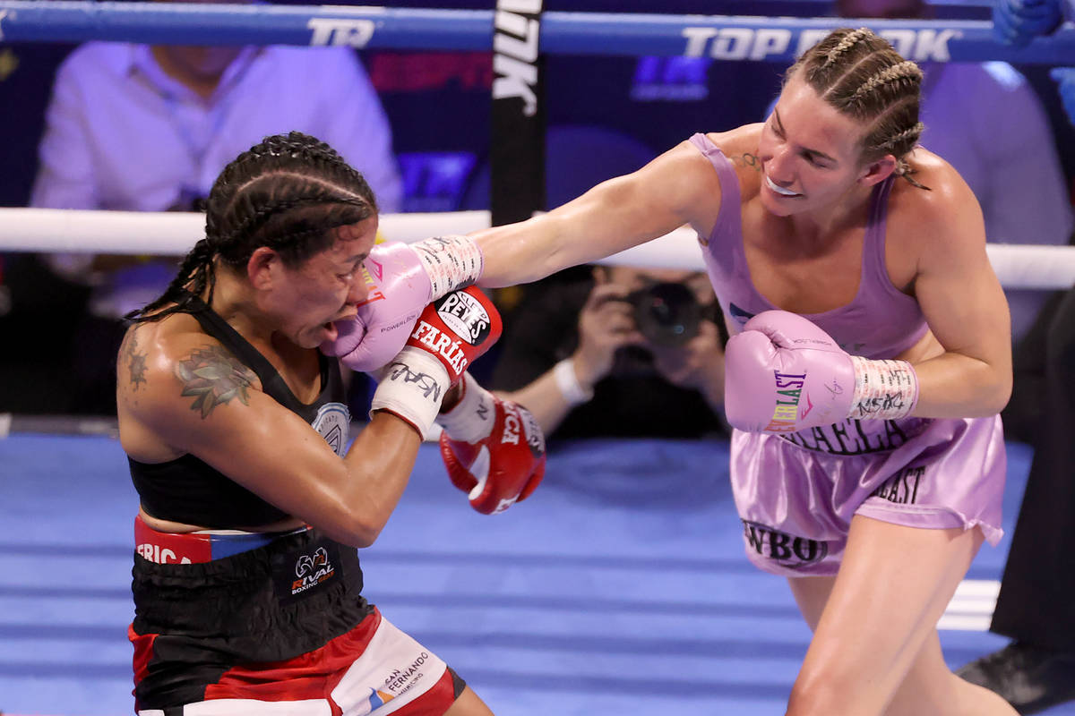 Mikaela Mayer, right, connects a punch against Erica Farias in the 10th round of the WBO Female ...