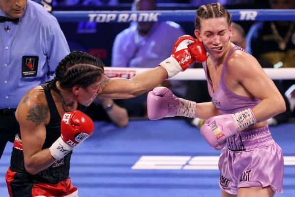Erica Farias, left, connects a punch against Mikaela Mayer in the eight round of the WBO Female ...