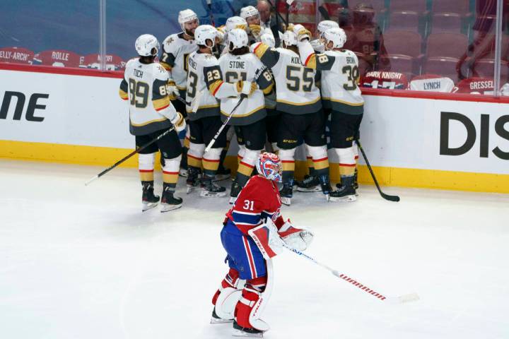 Montreal Canadiens goaltender Carey Price skates off the ice as members of the Vegas Golden Kni ...