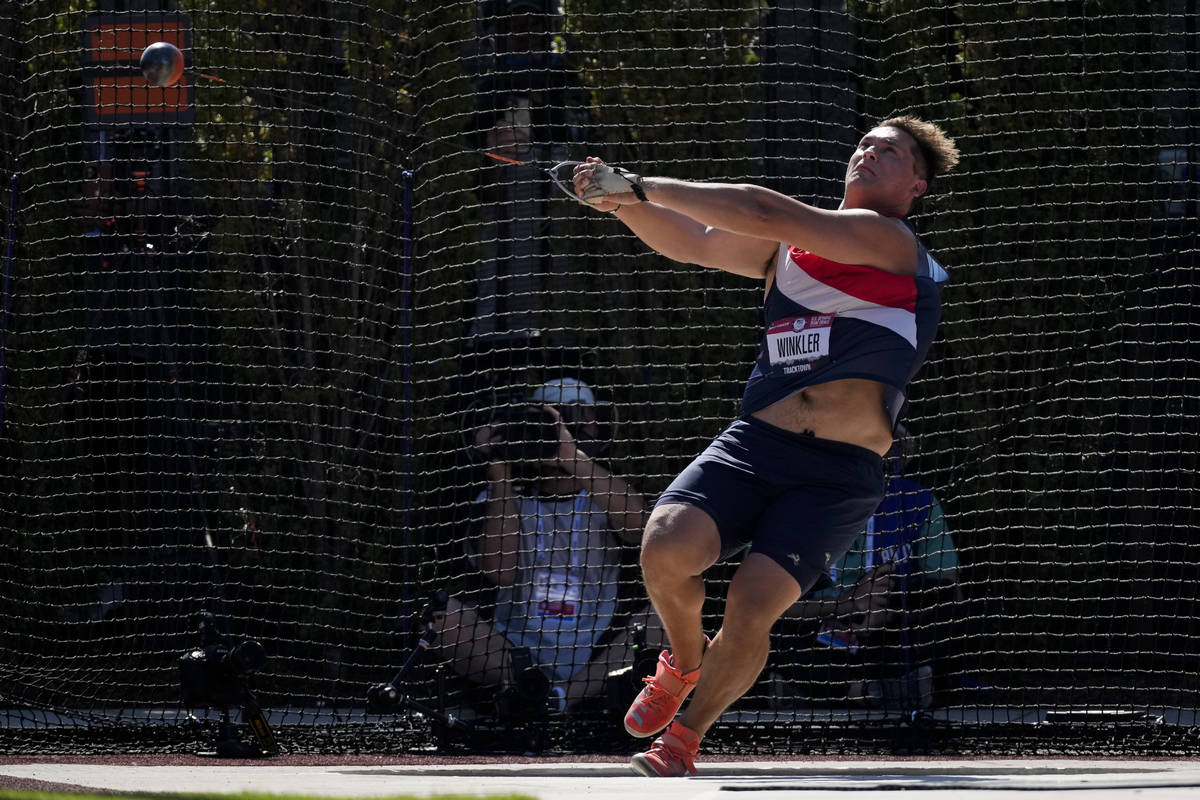 Rudy Winkler sets an American record during the finals of the men's hammer throw event at the U ...