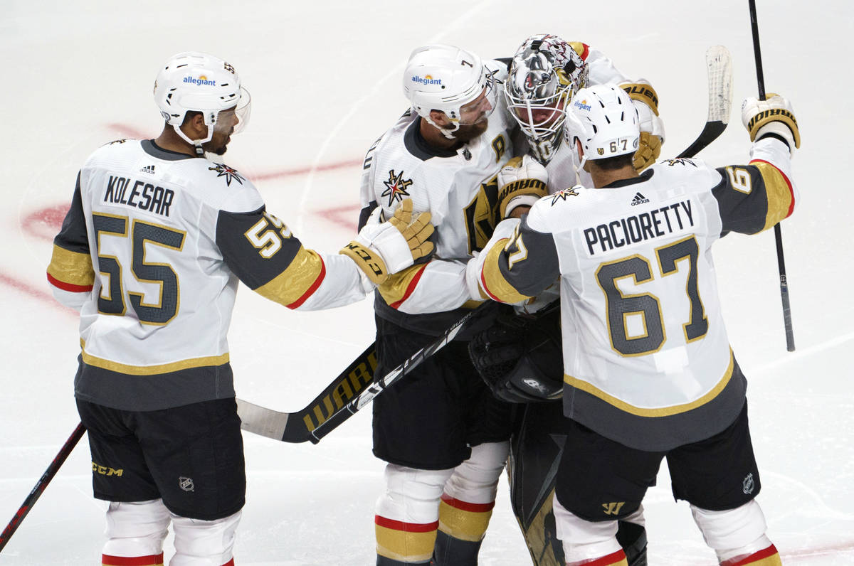 Vegas Golden Knights' Keegan Kolesar, Alex Pietrangelo and Max Pacioretty, left to right, gathe ...