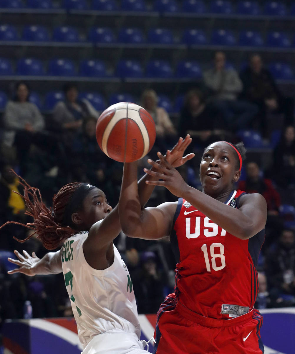United States' Chelsea Gray, right, tries to score as Nigeria's Sarah Ogoke blocks her during t ...