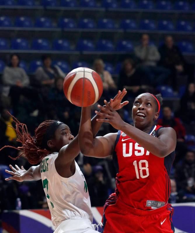 United States' Chelsea Gray, right, tries to score as Nigeria's Sarah Ogoke blocks her during t ...