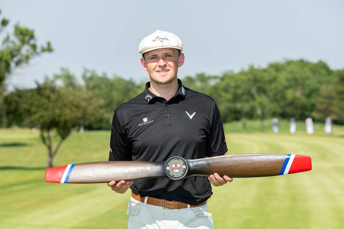 WICHITA, KS - JUNE 20: Harry Hall of England poses with the trophy after wining the Wichita Ope ...