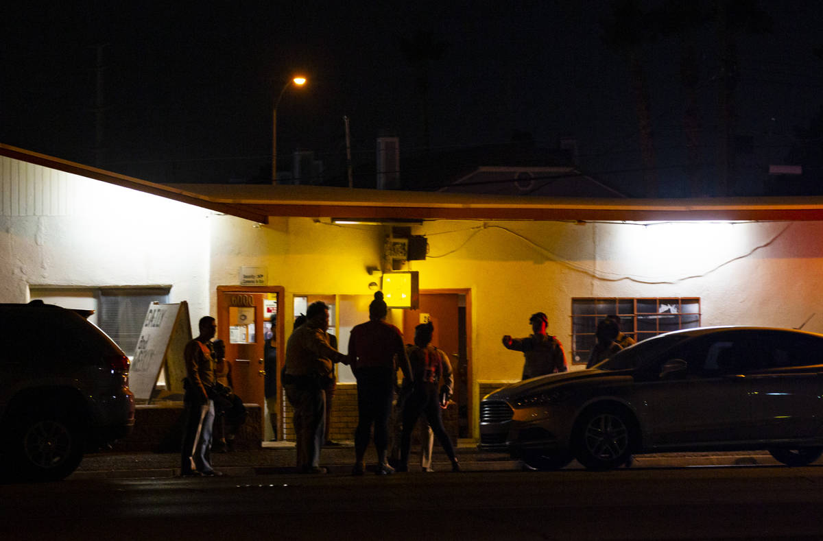 Las Vegas police investigate the scene of a homicide on Boulder Highway north of Russell Road i ...