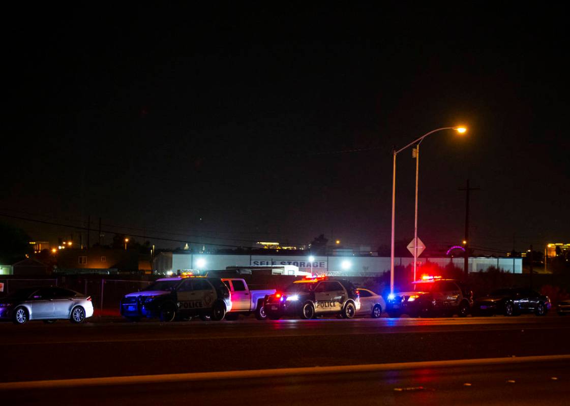 Las Vegas police investigate the scene of a homicide on Boulder Highway north of Russell Road i ...