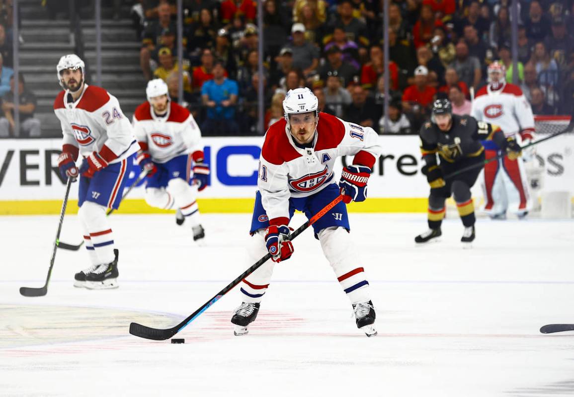 Montreal Canadiens' Brendan Gallagher (11) skates with the puck during the second period of Gam ...