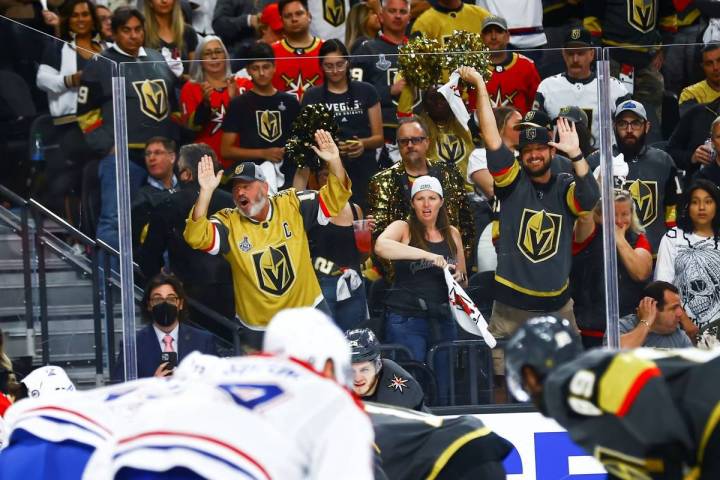 Golden Knights fans cheer during the third period of Game 5 of an NHL hockey Stanley Cup semifi ...