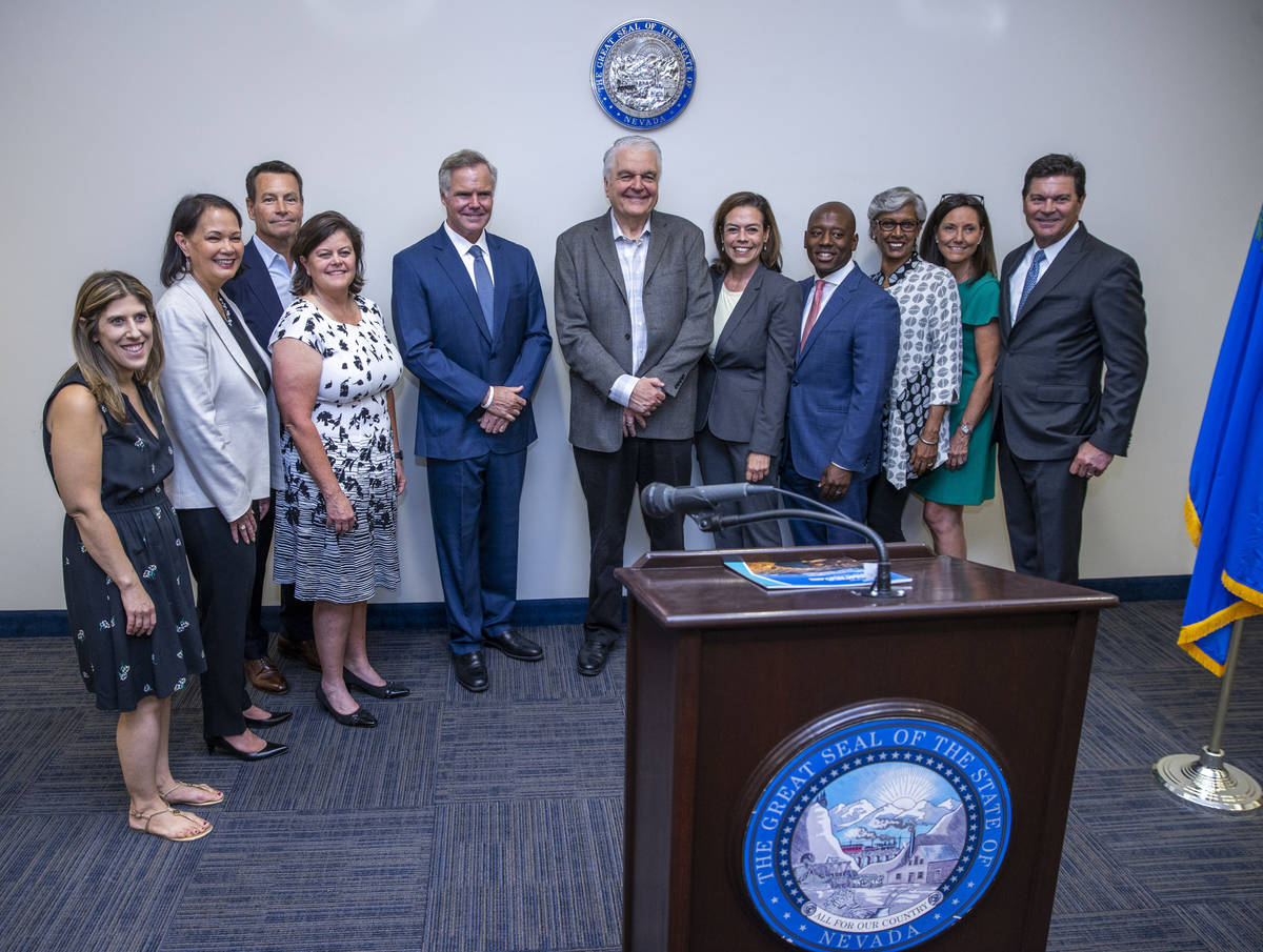 Gov. Steve Sisolak, center, joins the Nevada COVID-19 Response, Relief and Recovery Task Force ...