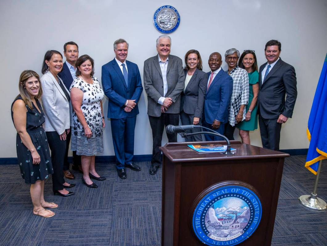 Gov. Steve Sisolak, center, joins the Nevada COVID-19 Response, Relief and Recovery Task Force ...