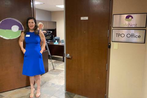 SafeNest CEO Liz Ortenburger stands outside the domestic violence shelter's new temporary prote ...