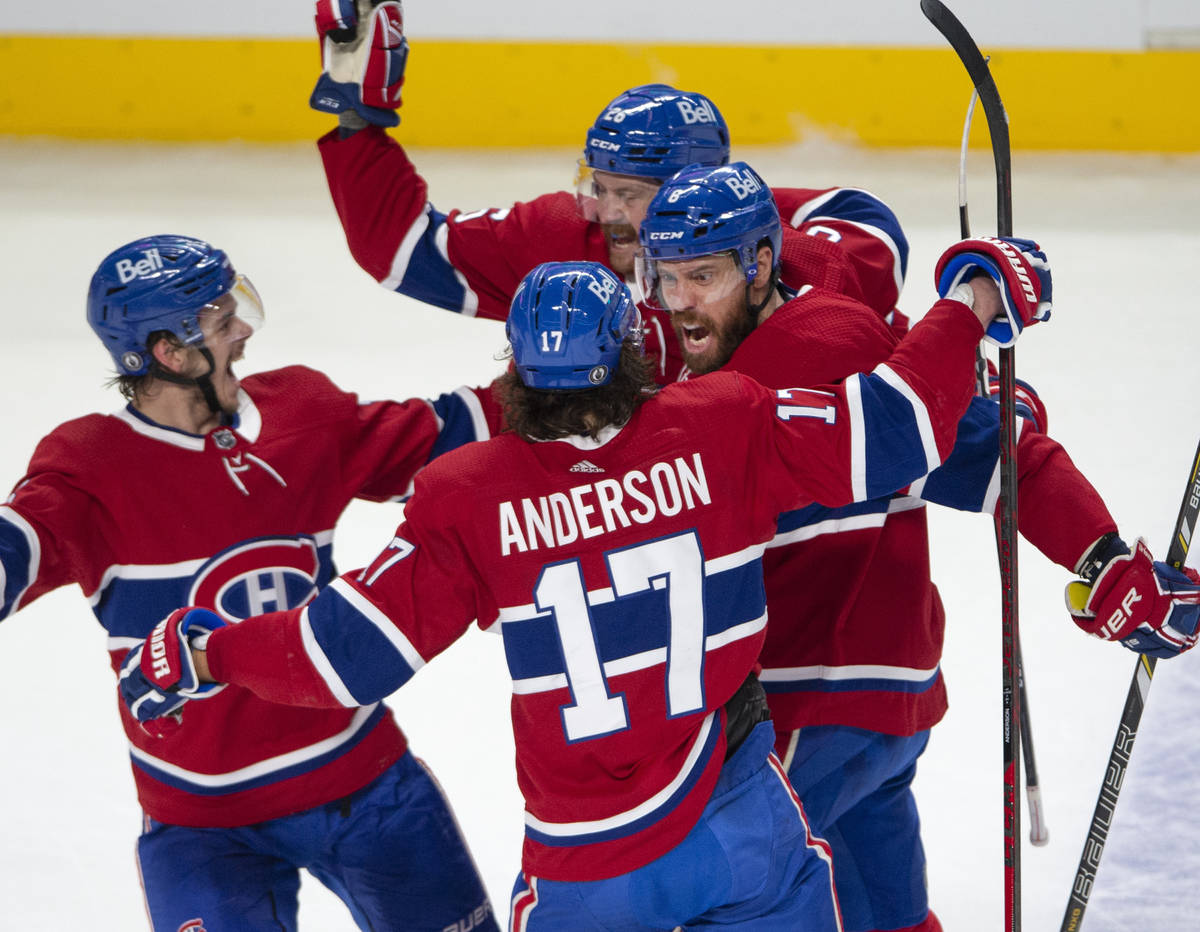 Montreal Canadiens defenseman Shea Weber (6) celebrates with teammates after scoring the first ...