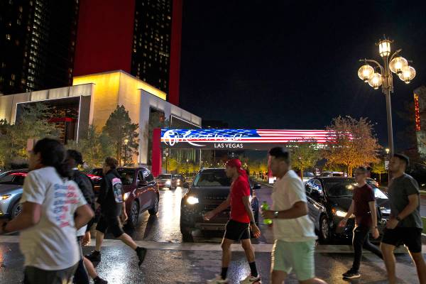 Pedestrians cross Las Vegas Boulevard at Resorts World Avenue outside Resorts World Las Vegas o ...